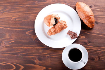croissant with chocolate on the plate
