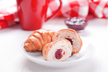 croissant with strawberry jam