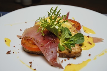 Poached egg on a piece of bread with beacon