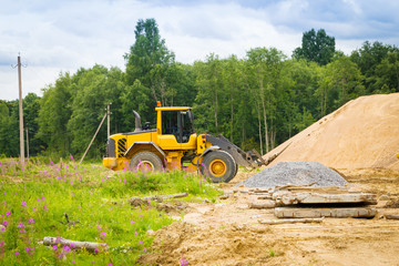 Yellow excavator at work