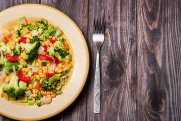 raw vegetable mix on the yellow plate