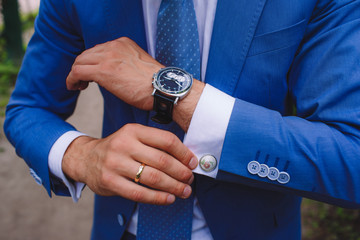 Elegant businessman, male hands corrected cufflinks © dron285