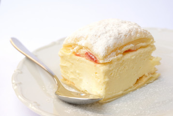 Sweet dessert of puff pastry and vanilla pudding