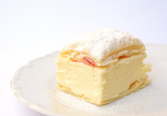 Sweet dessert of puff pastry and vanilla pudding