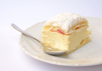 Sweet dessert of puff pastry and vanilla pudding