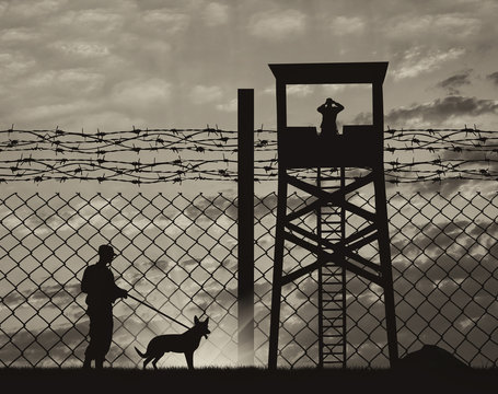 Security guard with dog on the border