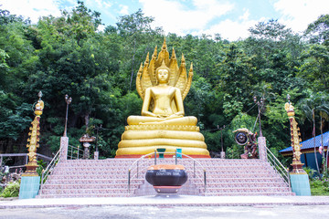 big golden buddha statue in thai temple