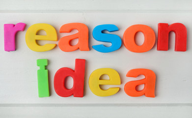Reason idea words on table