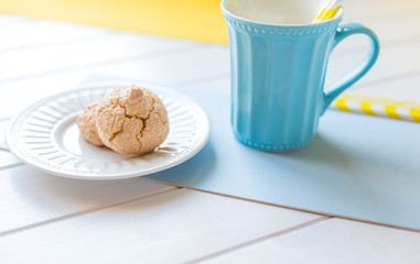 Tea with cookies on wooden background