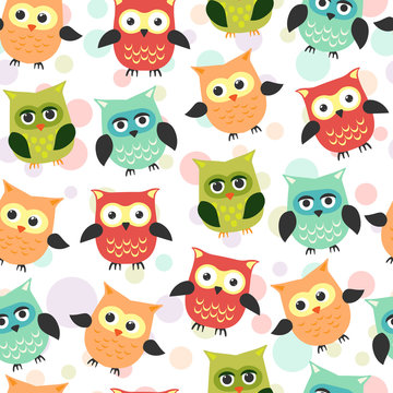 Seamless pattern with owls in cartoon style