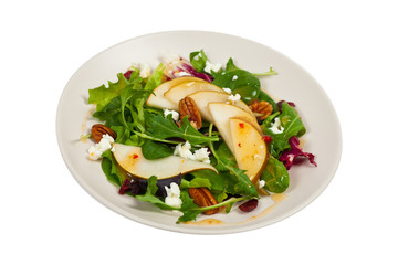 Pear Salad with Goat Cheese. Isolated on white. Selective focus.