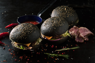 Delicious black burger with spices