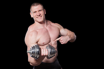 Fototapeta na wymiar male bodybuilder with dumbbells