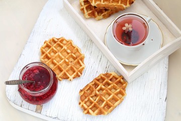 waffles with jam and tea