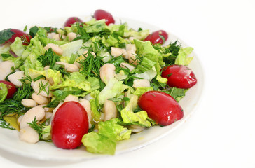 salad with beans and red tomatoes - mediterranean salad