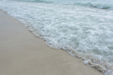 Water clear on sandy beach