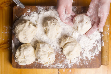 Making dough by female hands