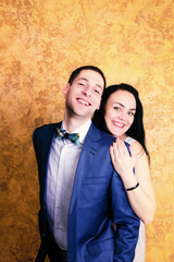 Close up picture of a happy couple smiling to the camera