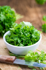 Parsley (on wooden background)