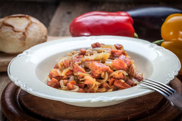 Pieces of sausage fried.