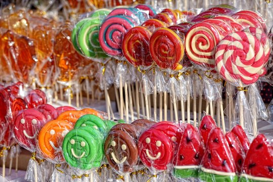 Lot of colorful sweets and lollipops at fair