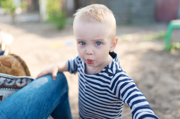 The little sailor with a blond hair.