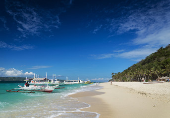 Fototapeta na wymiar traditional filipino ferry taxi tour boats puka beach boracay ph