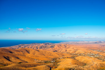 Aerial view on Fuerteventura island from Morro Velosa viewpoint with beautiful soft mointains landscape