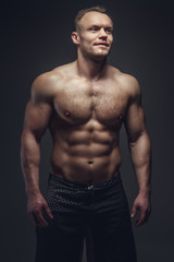 A man showing his athletic torso.