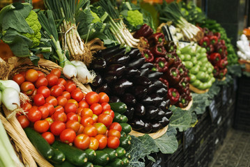 Fototapeta na wymiar Vegetables in basket market focus tomatoes