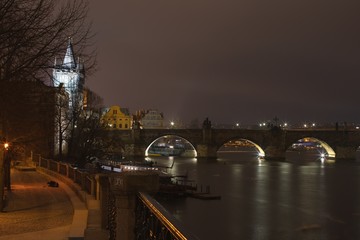Night Picture of the Charles Bridge in Prague, One of most beautiful gothic buildings in Prague, capital of Czech Republic. Builded by king Charles IV, king of Czech kingdom and roman emperator.