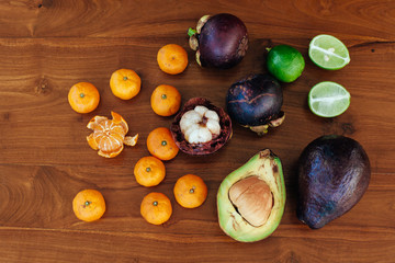 Exotic fruits variety on vintage wooden table
