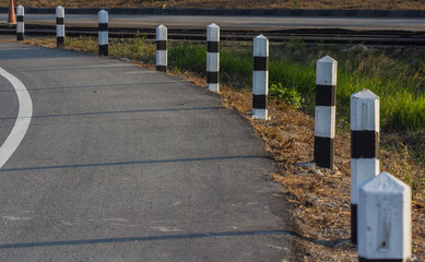 Black and white pole in wayside 
