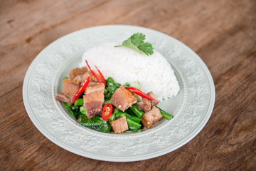 Stir fried crispy pork with jasmine rice.