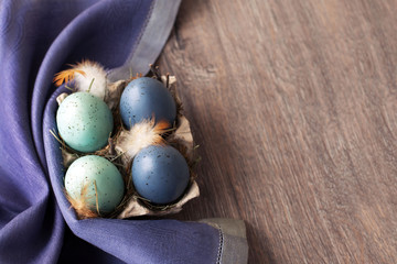 Easter eggs on wooden background