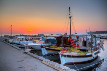 Fototapeta premium Beautiful sunrise in the little harbor of planos on the island of Zakynthos, Greece
