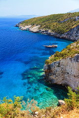 Luxurious ship in a bay on the island of Zakynthos with beautiful blue waters