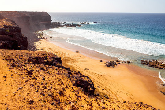 Sandy rocky coastline on the north western part of Fuerteventura island near El Cotillo village