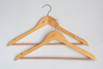 Two Over Lapping Wooden Coat Hangers
