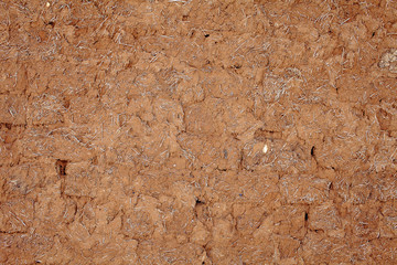 Textured old adobe wall
