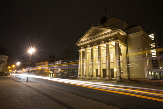 theater detmold germany in the evening with traffic lights
