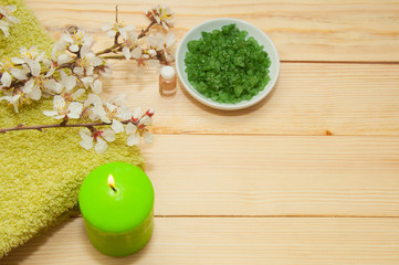 Beautiful spa composition with spring flowers on table close up