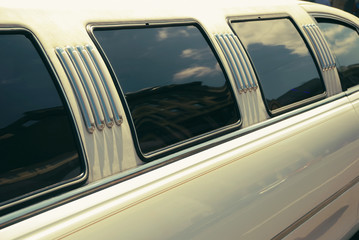 White wedding limousine long side view with windows - obrazy, fototapety, plakaty