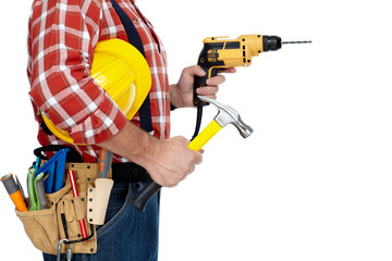 Builder handyman with drill and hammer.