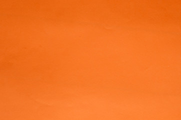 Orange saturated flat color paper background texture