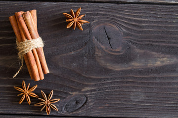cinnamon and star anise on a wooden background
