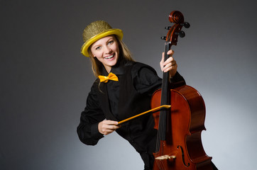 Fototapeta premium Young woman in musical concept