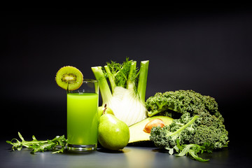healthy vegetable juices for refreshment and as an antioxidant . Black background