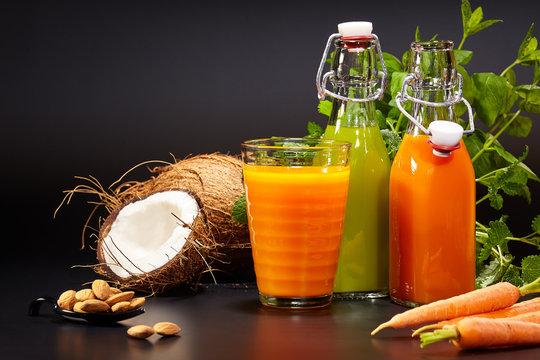 Glasses with fresh vegetable juices isolated on Black. Detox diet.