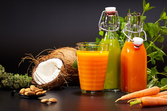 Glasses with fresh vegetable juices isolated on Black. Detox diet.